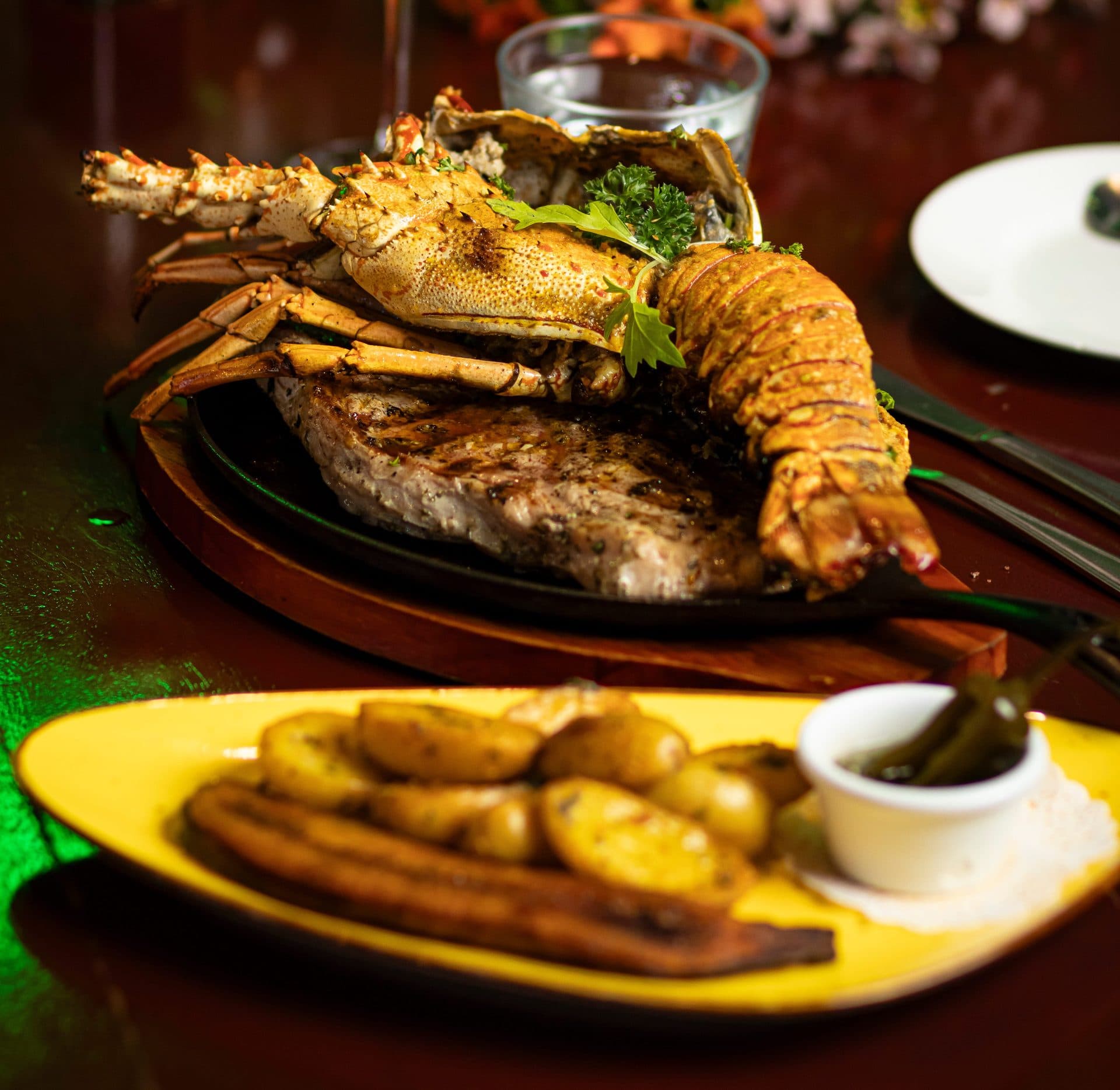 Premium steak grilled over open flame at Nanku steakhouse